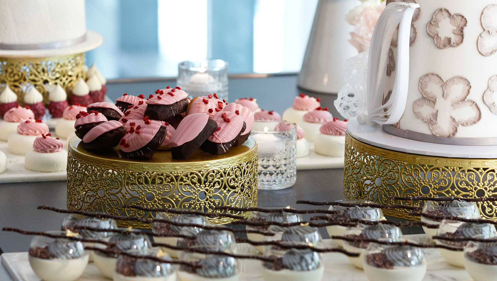 A table filled with an assortment of desserts