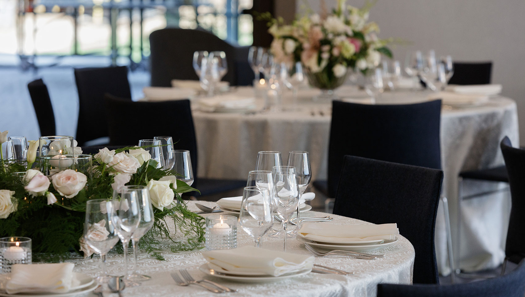 Tables decorated for a special event dinner