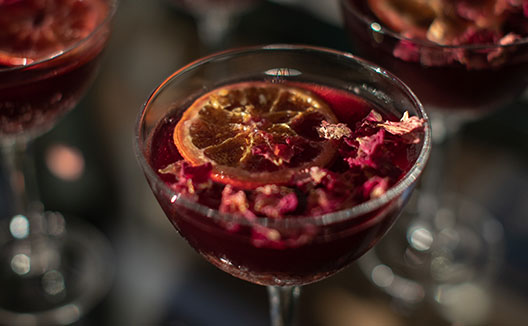 Cocktail with orange garnish